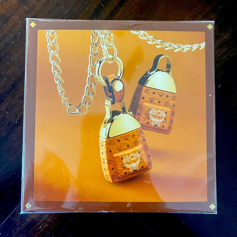 MCM eau de parfum cologne necklace. NWOT